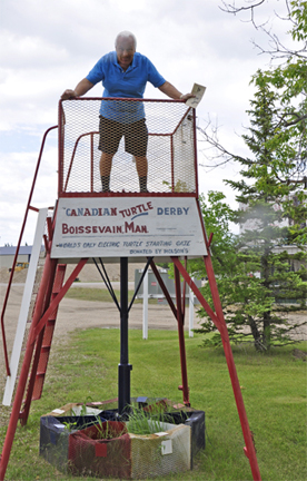 Lee Duquette on the worlds only electric turtle starting gate in Boissevain, Manatoba